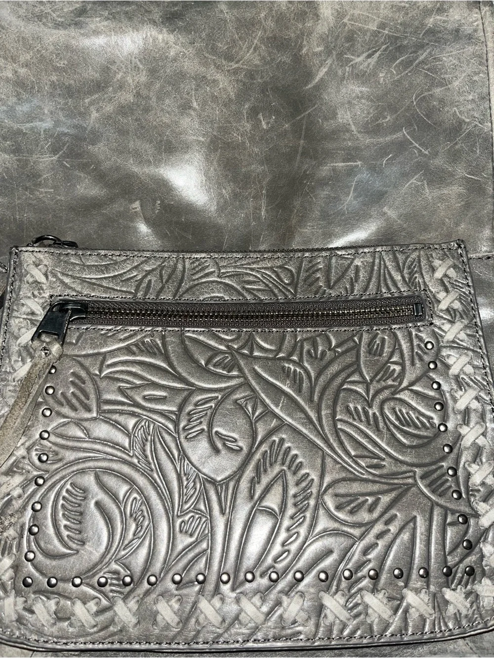 The Sak Metallic Gray Embossed Leather Backpack